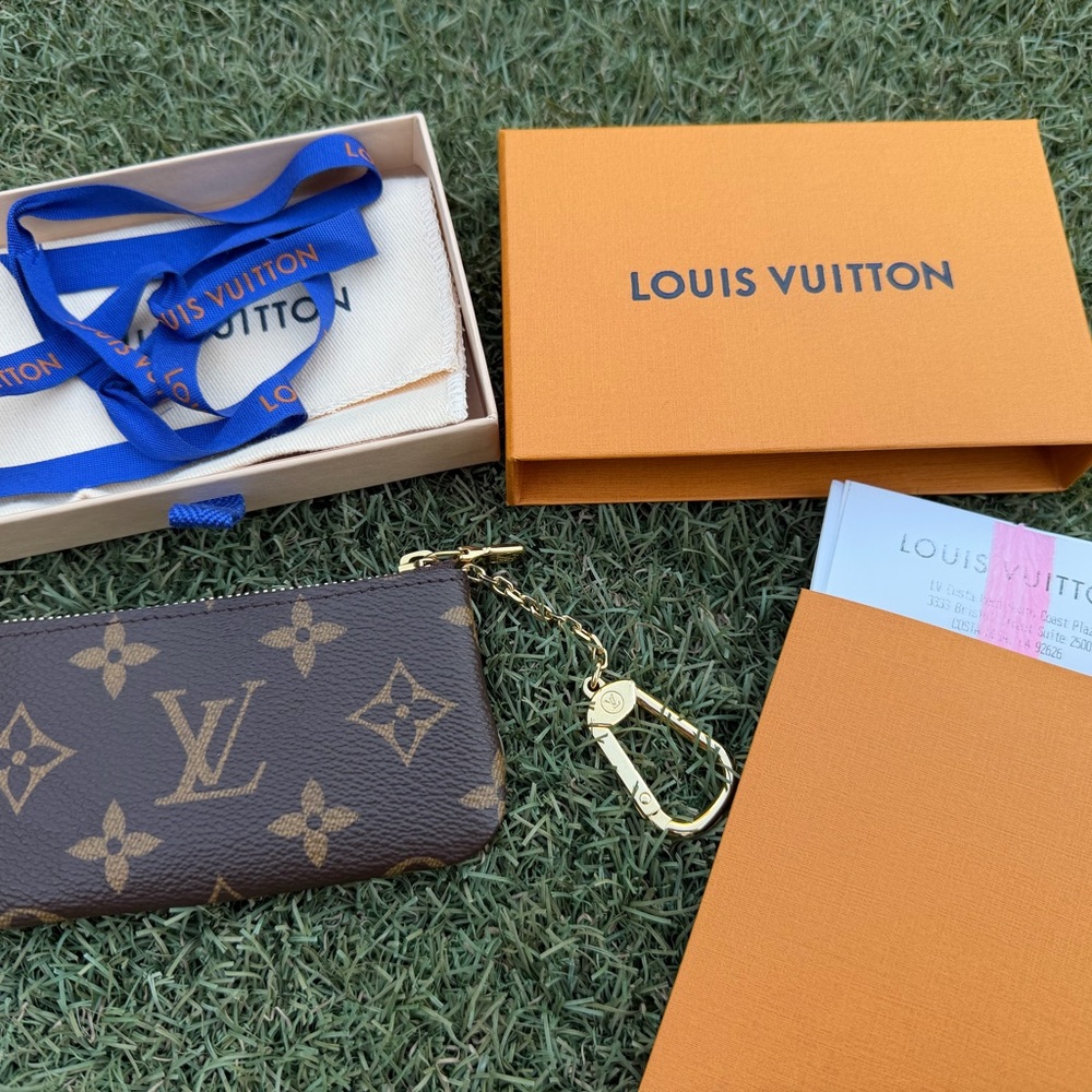 Louis Vuitton Monogram Mini Pouch in Brown with Gold Hardware